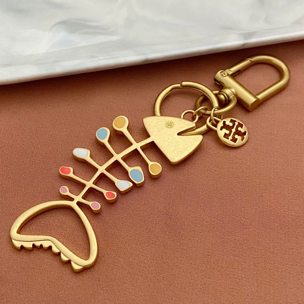 Tory Burch Enamel Inlay Fish Bone Keychain Pendant